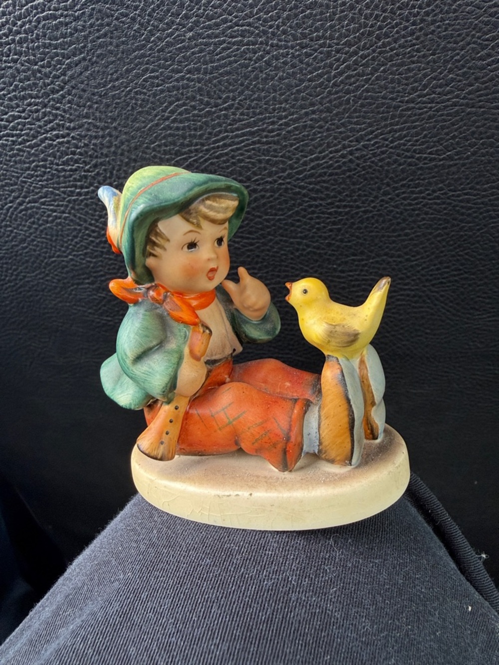 Hummel Hand-Painted Green and Orange Boy with Yellow Bird Figurine